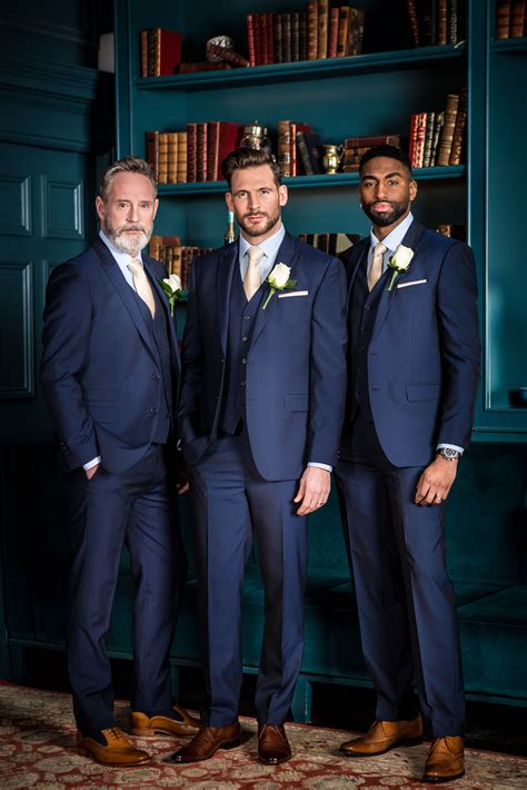 groomsmen blue suits wedding